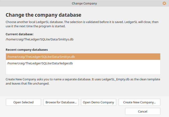 LedgerSL Change Company dialog in the light theme, showing the current database, recent company databases, and options to browse, open the demo, or create a new company