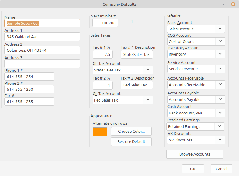 LedgerSL Company Defaults showing company information, sales taxes, accounting defaults, and appearance settings