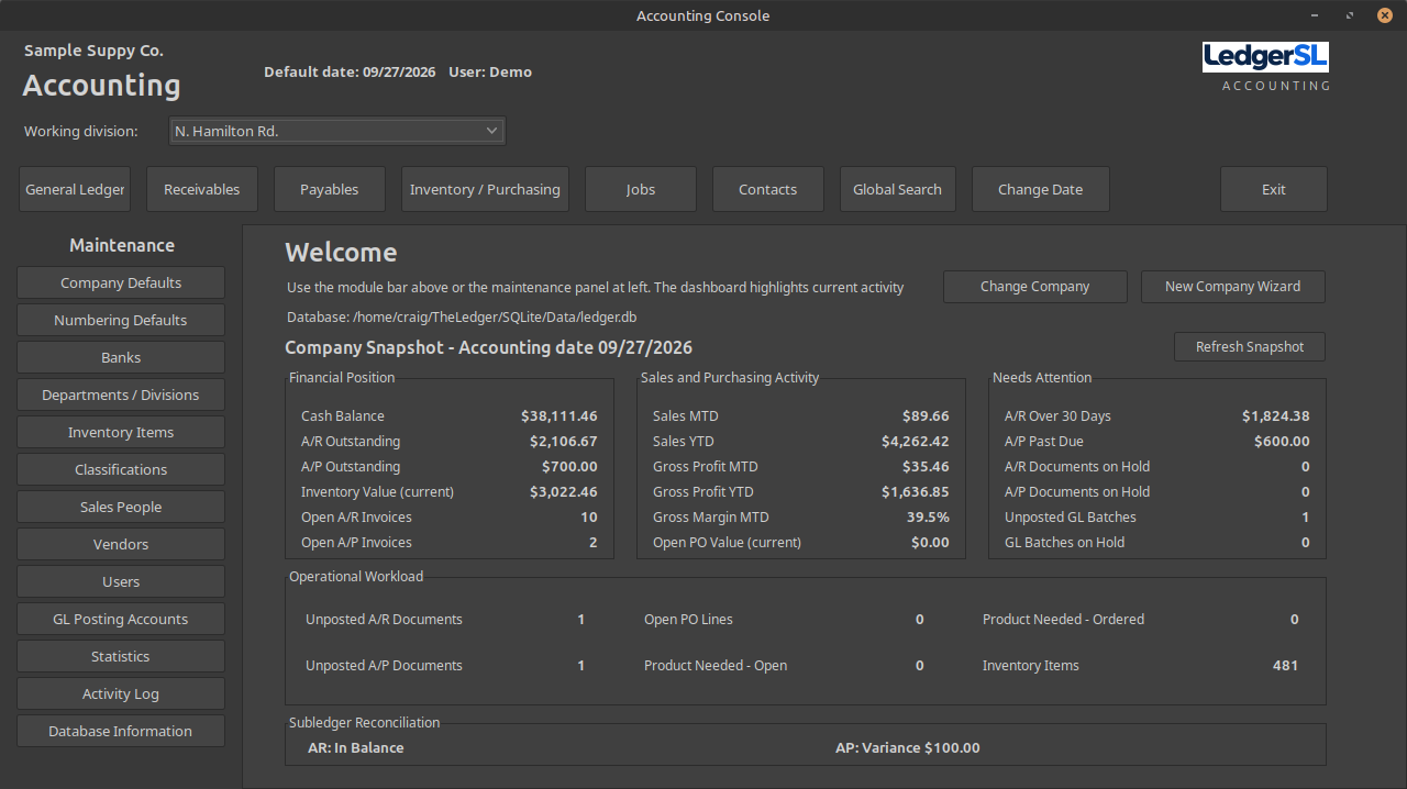 LedgerSL Main Console in Linux Mint's Dark theme, showing company setup, module navigation, and the company snapshot
